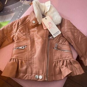 Stylish Pink Toddler Jacket with Ruffle Hem